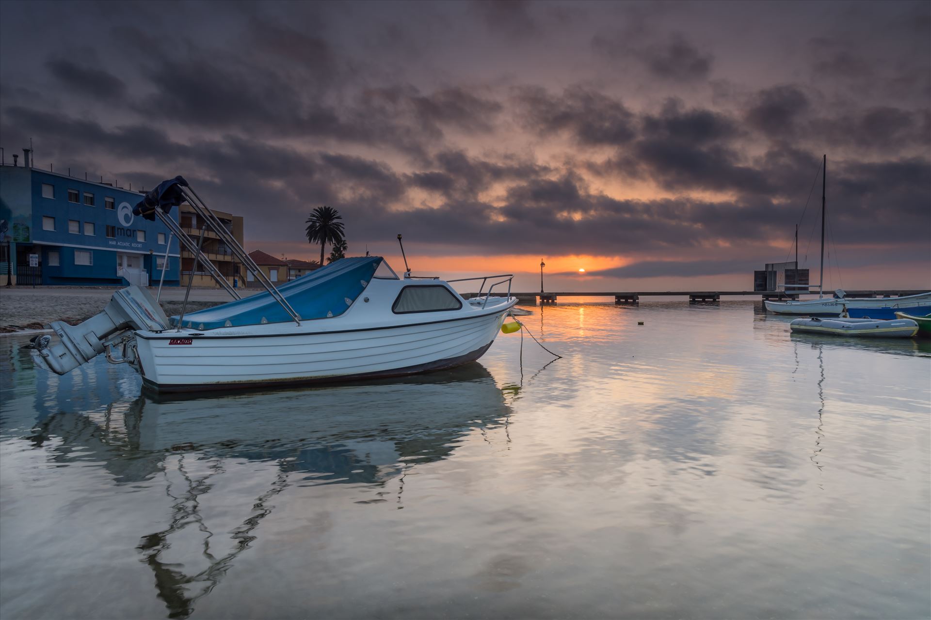 Sunrise over the Mar Menor - The Mar Menor (meaning Minor sea or Smaller Sea in Spanish)  is a coastal salty lagoon in the Iberian Peninsula of Spain with a surface area of nearly 170 km². With warm and clear water no more than 7 metres in depth, it is the largest lagoon in Spain. by philreay