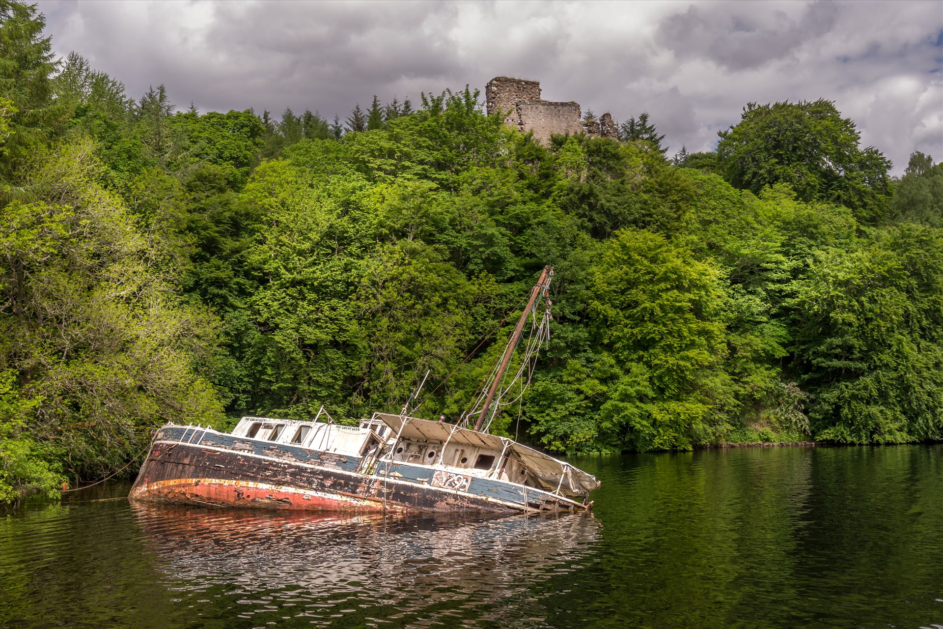 Invergarry Castle & the Eala Bhan - The Eala Bhan shipwreck overlooked by Invergarry Castle on Loch Oich, part of the Caladonian Canal. by philreay