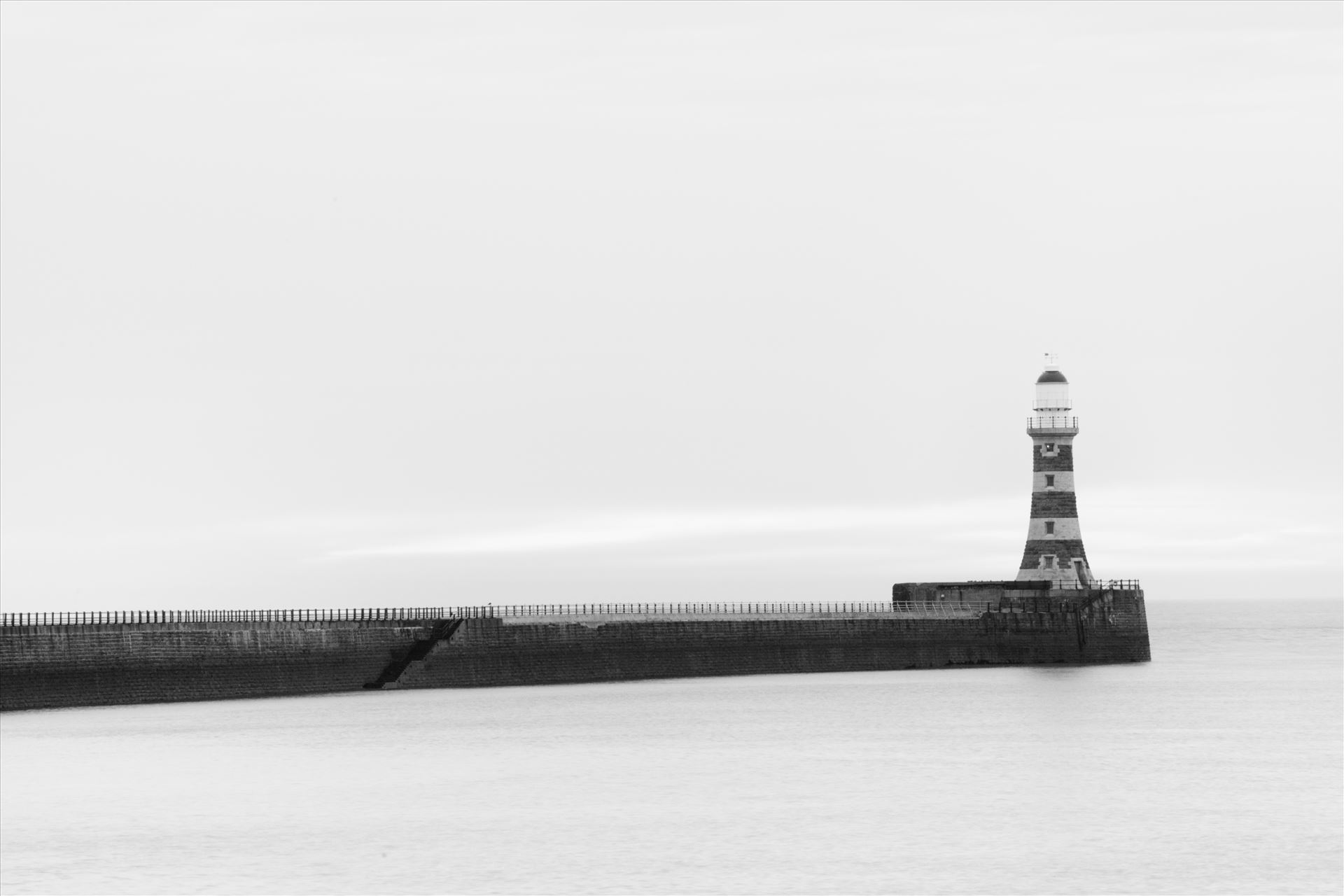 Roker Pier, Sunderland - For over a hundred years, Roker Pier & Lighthouse has protected the entrance into Sunderland's harbour with the pier, and distinctive red and grey granite hoops of the lighthouse, as one of the City's most iconic landmarks. by philreay