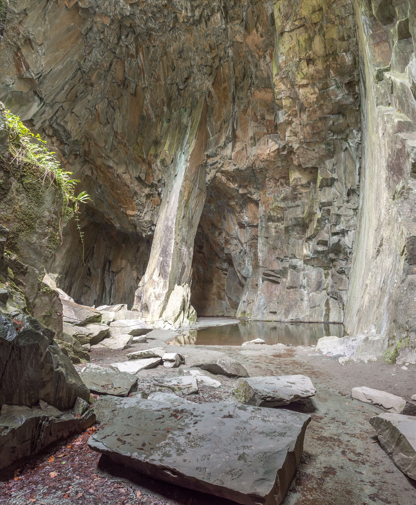 Cathedral Cave - The Cathedral quarries are a small network of inter-linked quarries above Little Langdale. The system is best known for its main chamber, which still stands forty feet in height. by philreay