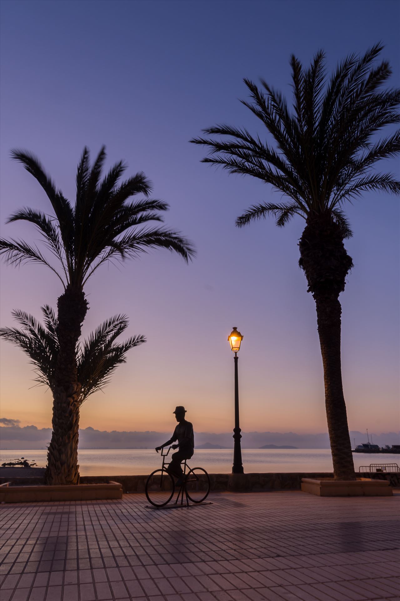 Cycling at sunrise -  by philreay