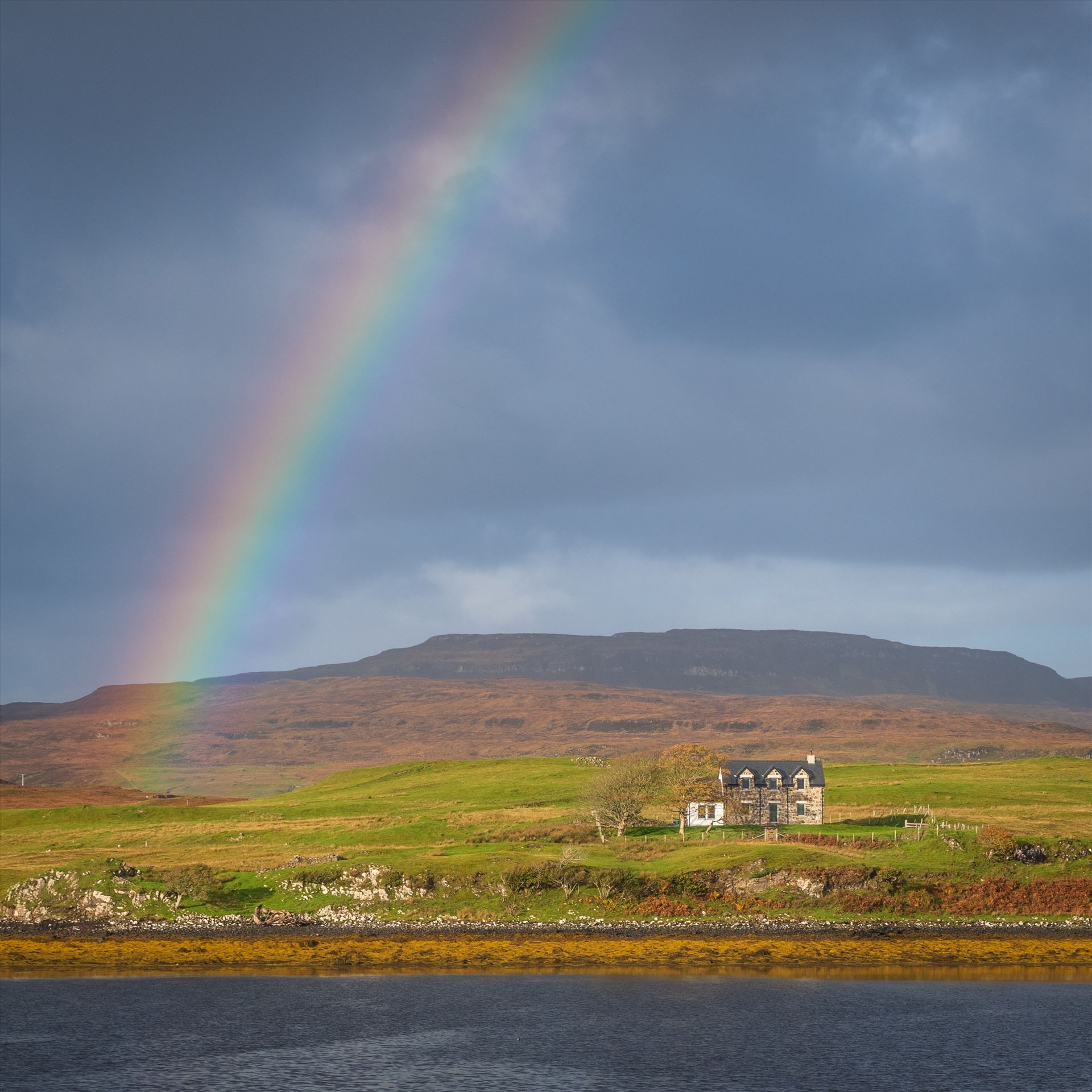 Rainbow over Loch Dunvegan on the Isle of Skye -  by philreay