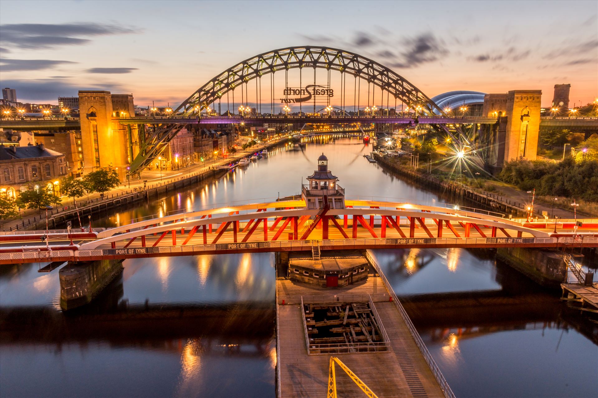 The River Tyne - In the foreground is the Swing bridge, at the top is the world famous Tyne bridge & under that is the Millennium bridge. by philreay