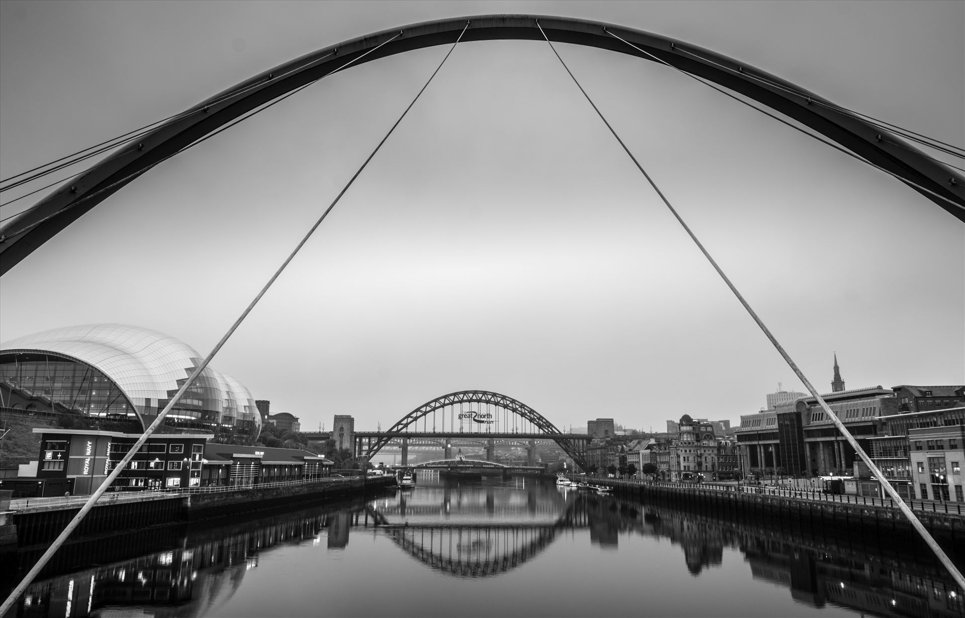 Millennium BridgeLooking up river from the Millennium Bridge towards the Tyne, Swing & High Level Bridges