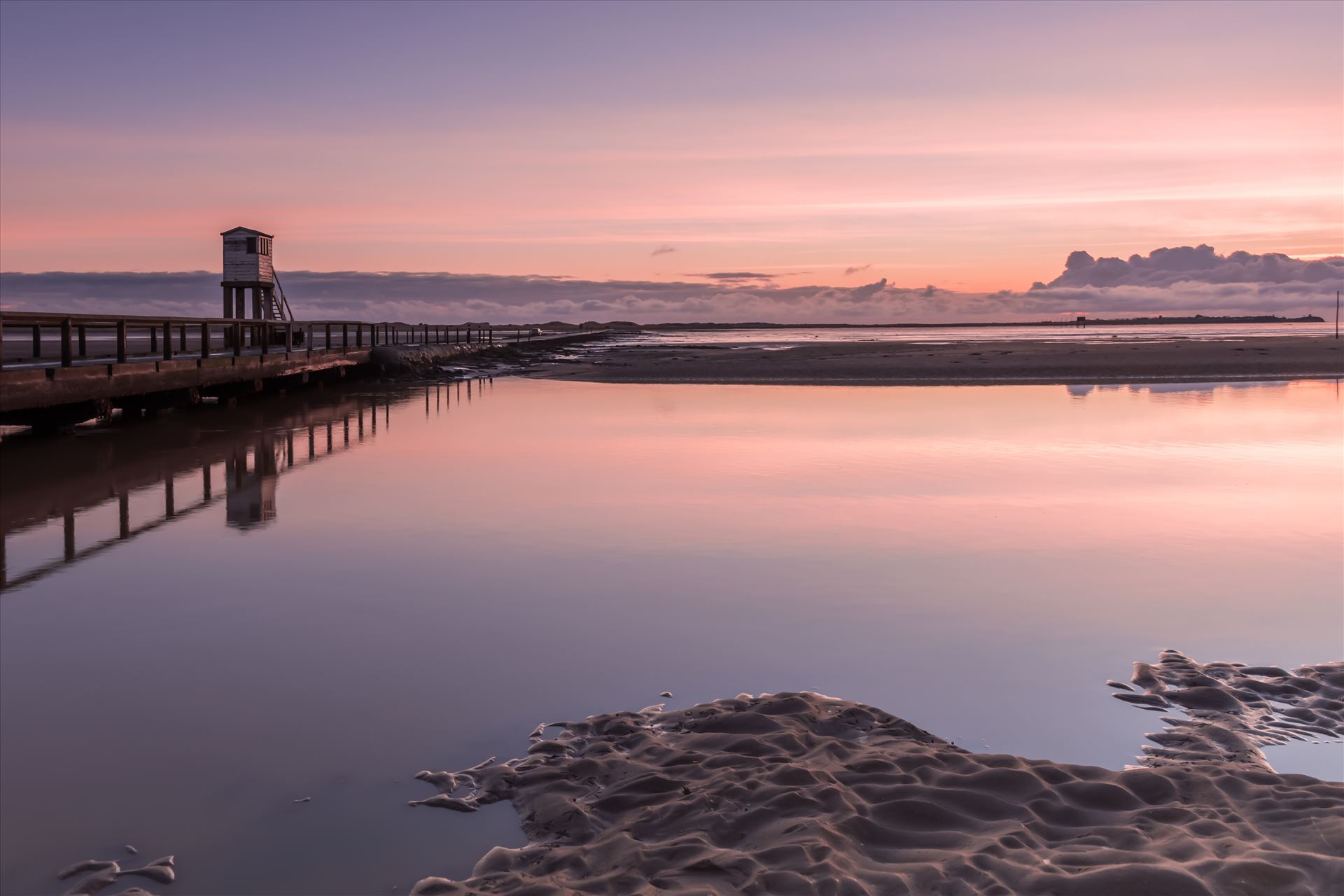 Holy Island causeway - The Holy Island of Lindisfarne is a tidal island off the northeast coast of England. It is also known just as Holy Island & is now a popular destination for visitors to the area. by philreay