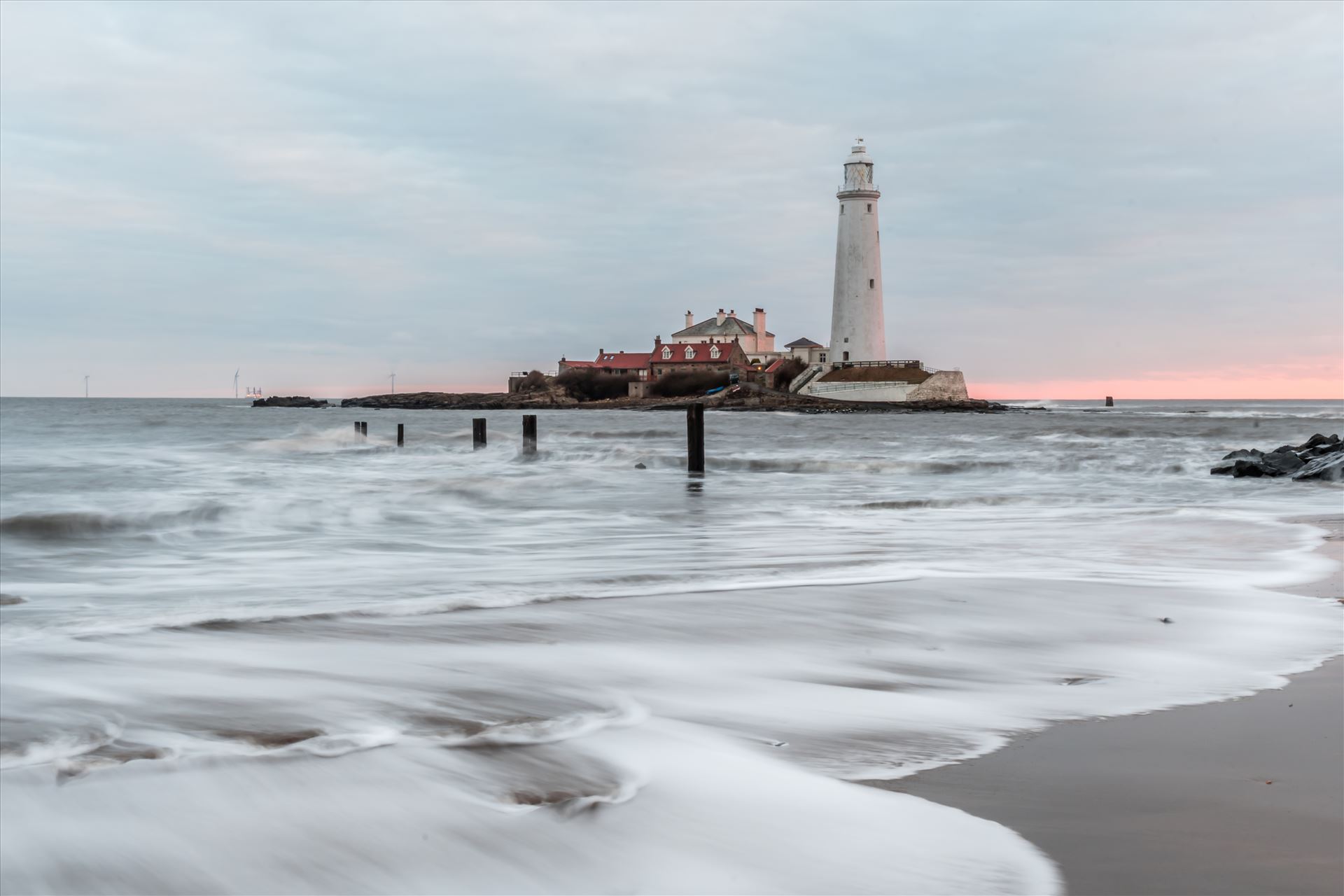 St Mary`s lighthouse, Whitley Bay - St Mary`s lighthouse stands on a small rocky tidal island is linked to the mainland by a short concrete causeway which is submerged at high tide. The lighthouse was built in 1898 & was decommissioned in 1984, 2 years after becoming automatic. by philreay