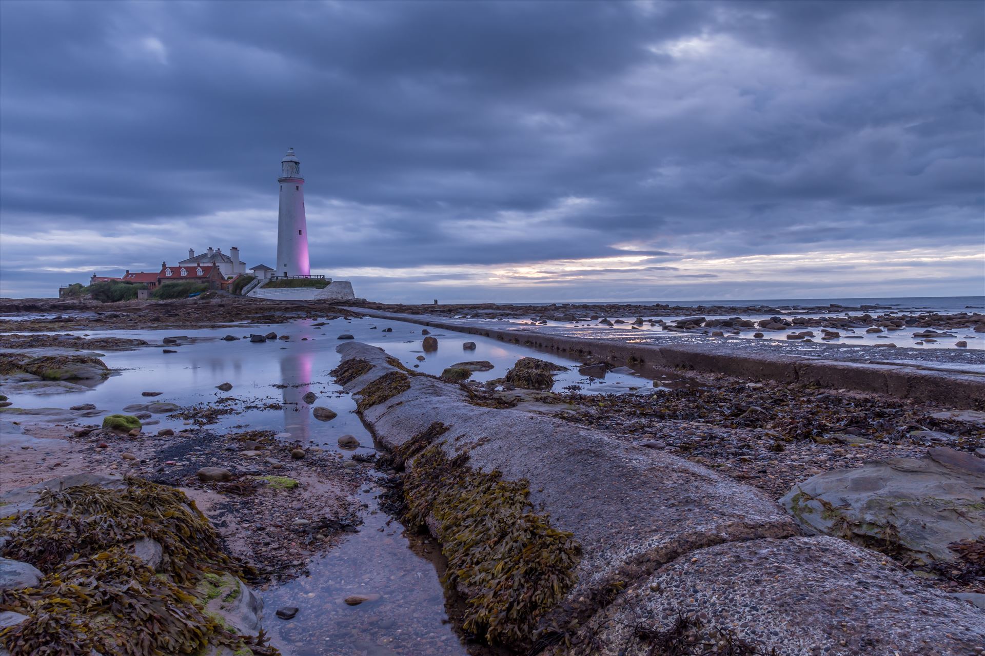 St Mary`s lighthouse, Whitley Bay - St Mary`s lighthouse stands on a small rocky tidal island is linked to the mainland by a short concrete causeway which is submerged at high tide. The lighthouse was built in 1898 & was decommissioned in 1984, 2 years after becoming automatic. by philreay