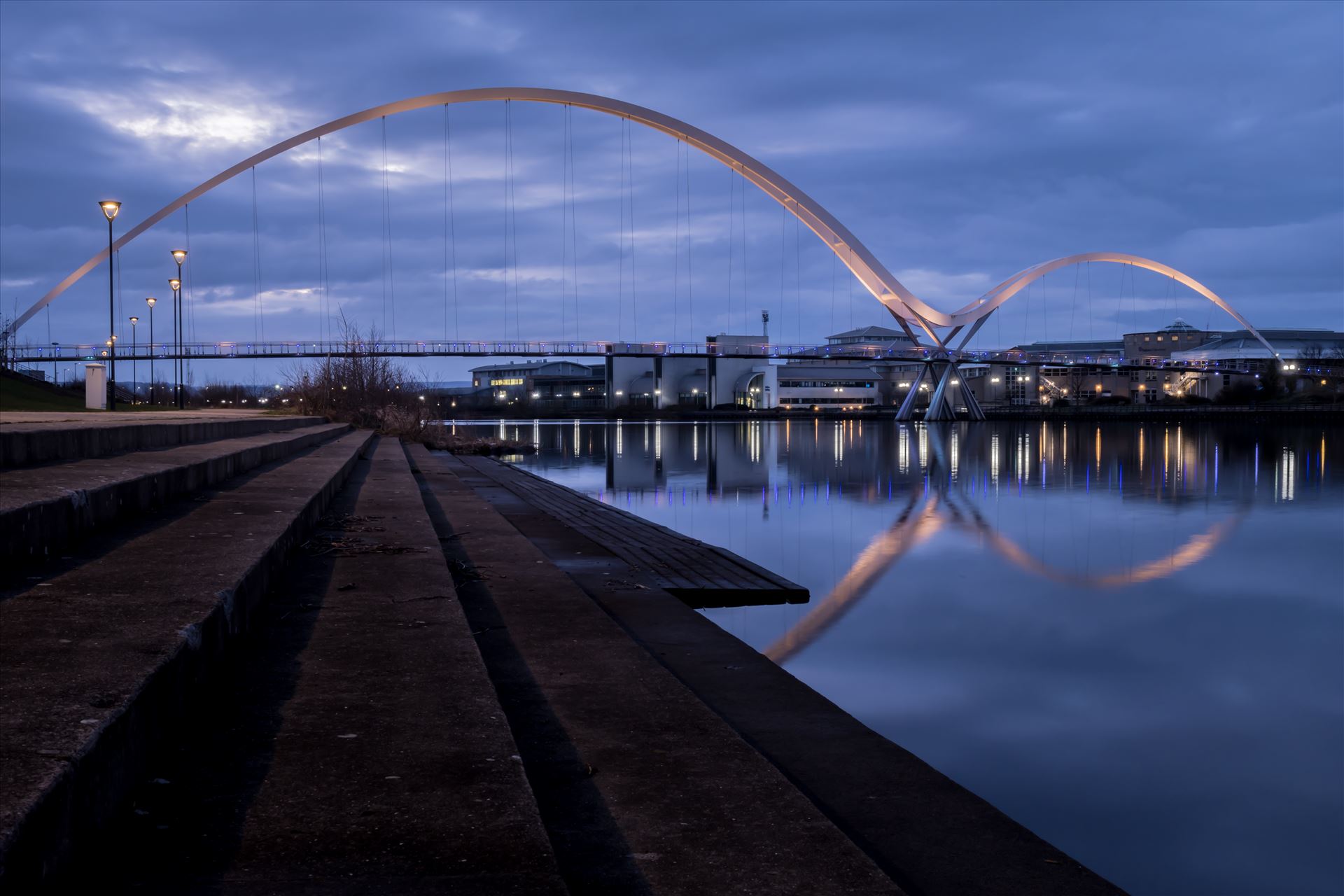 The Infinity Bridge 03 - The Infinity Bridge is a public pedestrian and cycle footbridge across the River Tees that was officially opened on 14 May 2009 at a cost of £15 million. by philreay