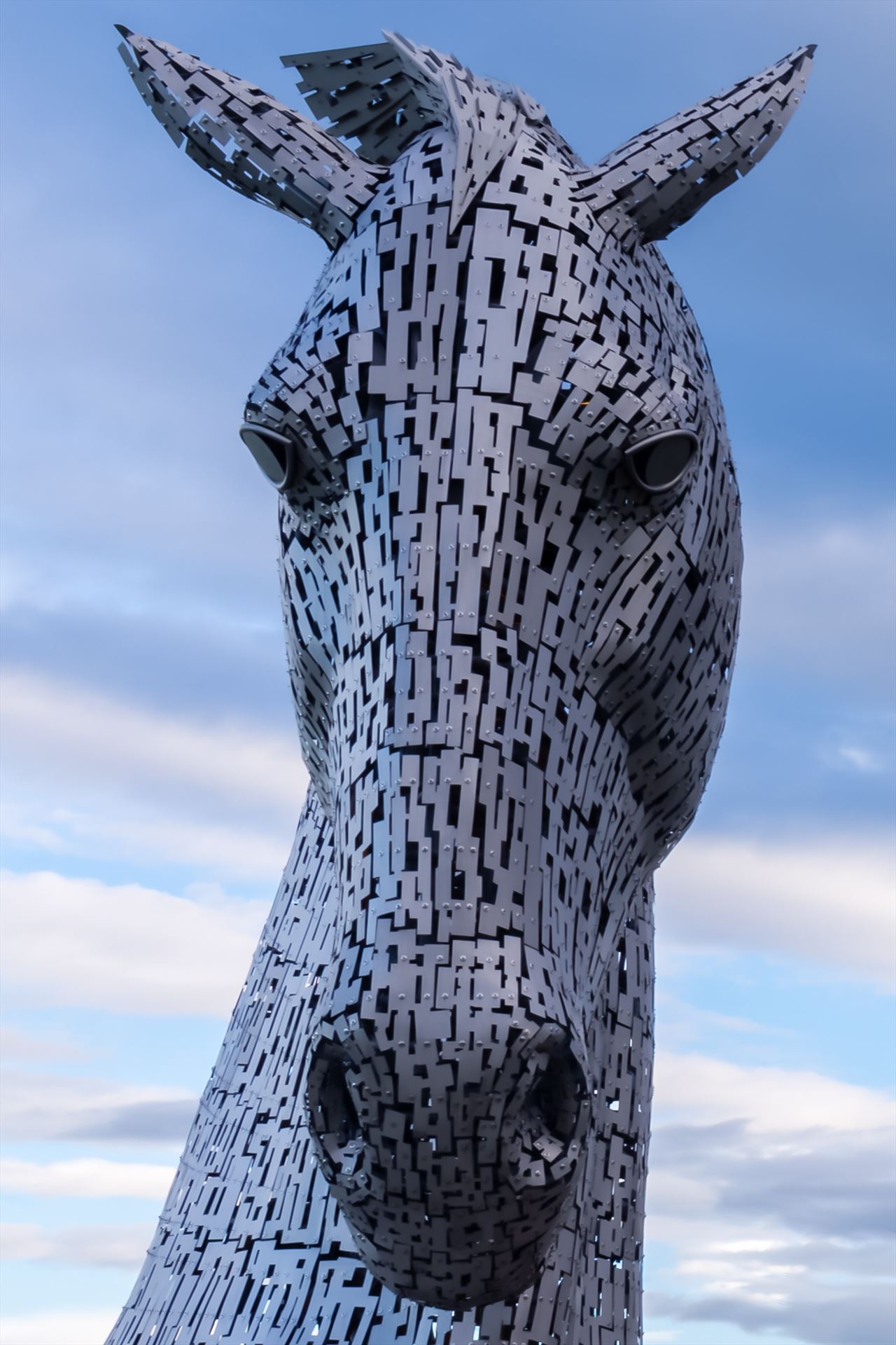 One of the Kelpies - The Kelpies are 30-metre-high horse-head sculptures, standing next to a new extension to the Forth and Clyde Canal at Falkirk. The Kelpies are a monument to horse powered heritage across Scotland. by philreay