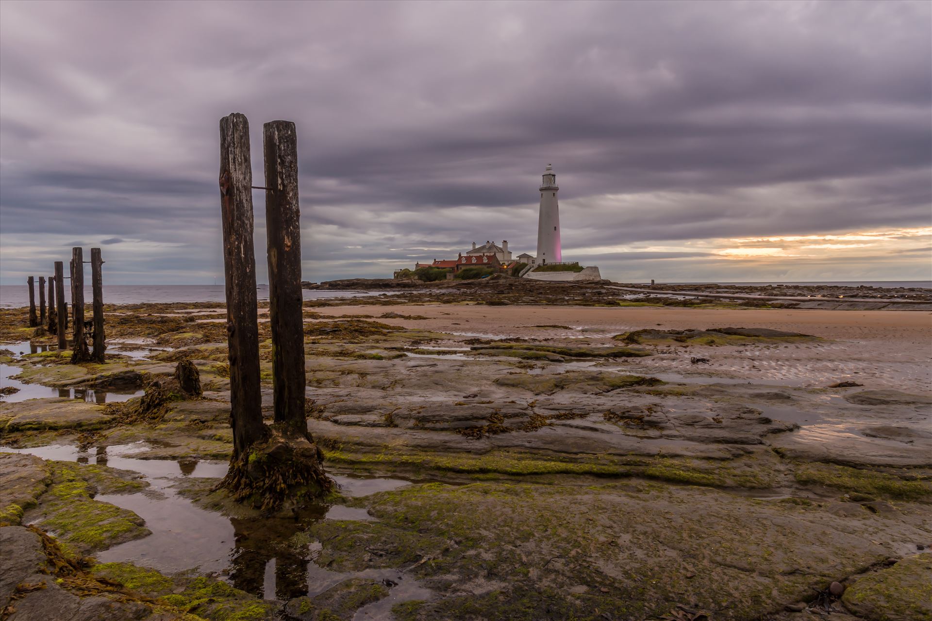 St Mary`s lighthouse, Whitley Bay - St Mary`s lighthouse stands on a small rocky tidal island is linked to the mainland by a short concrete causeway which is submerged at high tide. The lighthouse was built in 1898 & was decommissioned in 1984, 2 years after becoming automatic. by philreay