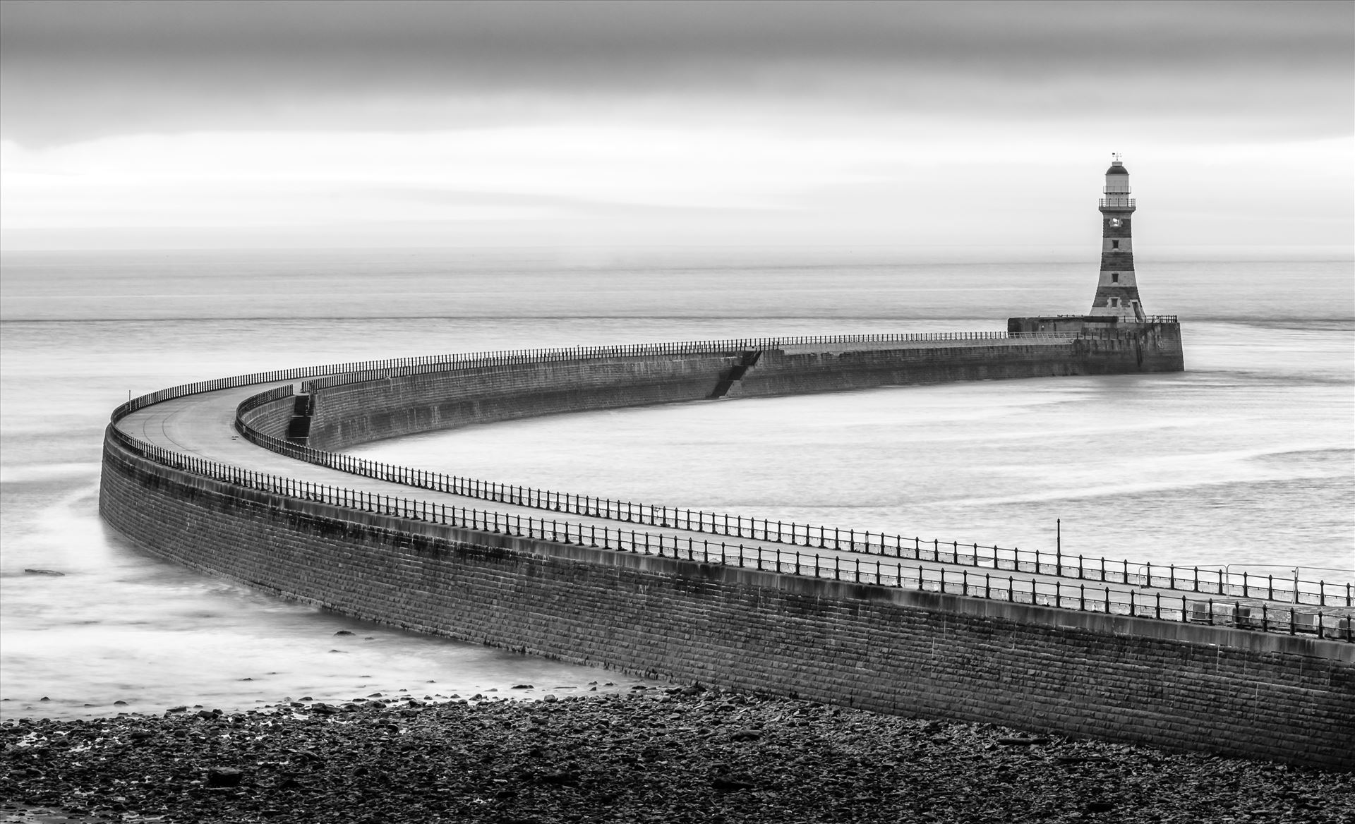 Roker Pier, Sunderland - For over a hundred years, Roker Pier & Lighthouse has protected the entrance into Sunderland's harbour with the pier, and distinctive red and grey granite hoops of the lighthouse, as one of the City's most iconic landmarks. by philreay