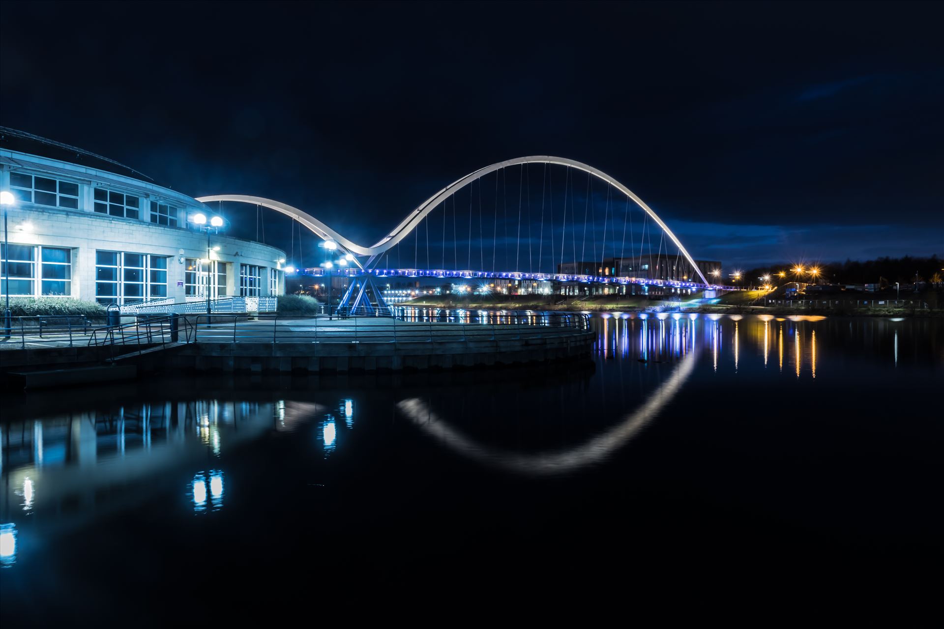 The Infinity Bridge 07 - The Infinity Bridge is a public pedestrian and cycle footbridge across the River Tees that was officially opened on 14 May 2009 at a cost of £15 million. by philreay
