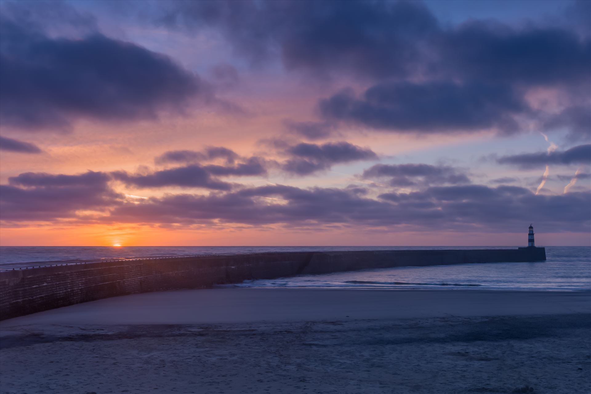 Seaham beach & pier - Another early start to catch this fabulous sunrise at Seaham beach. 
Seaham sits on the Durham coast in between Sunderland to the north & Hartlepool to the south. by philreay