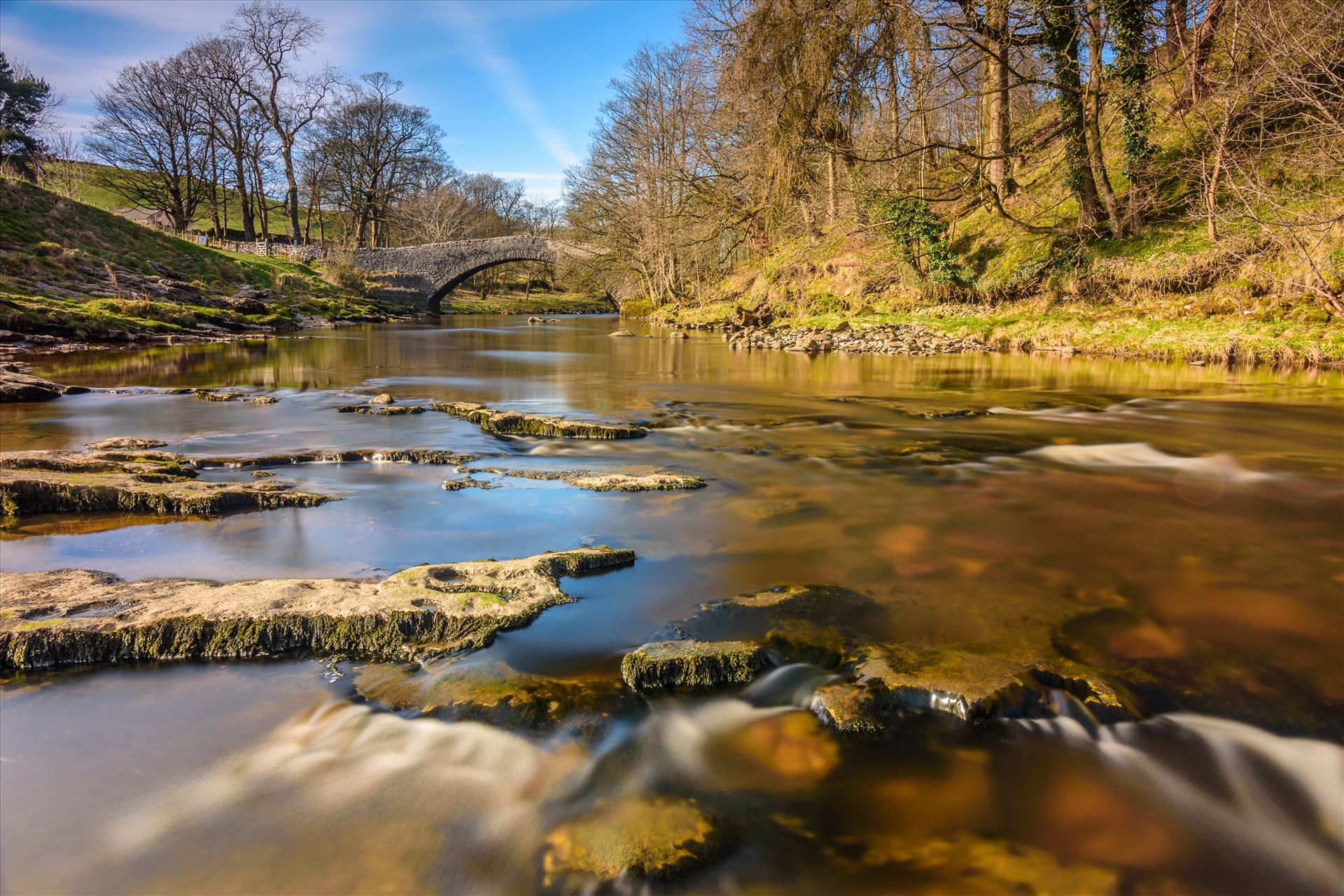 The River RibbleThis long exposure shot of 98 seconds was taken on the River Ribble near the small town of Settle, which sits at the southern edge of the Yorkshire Dales.