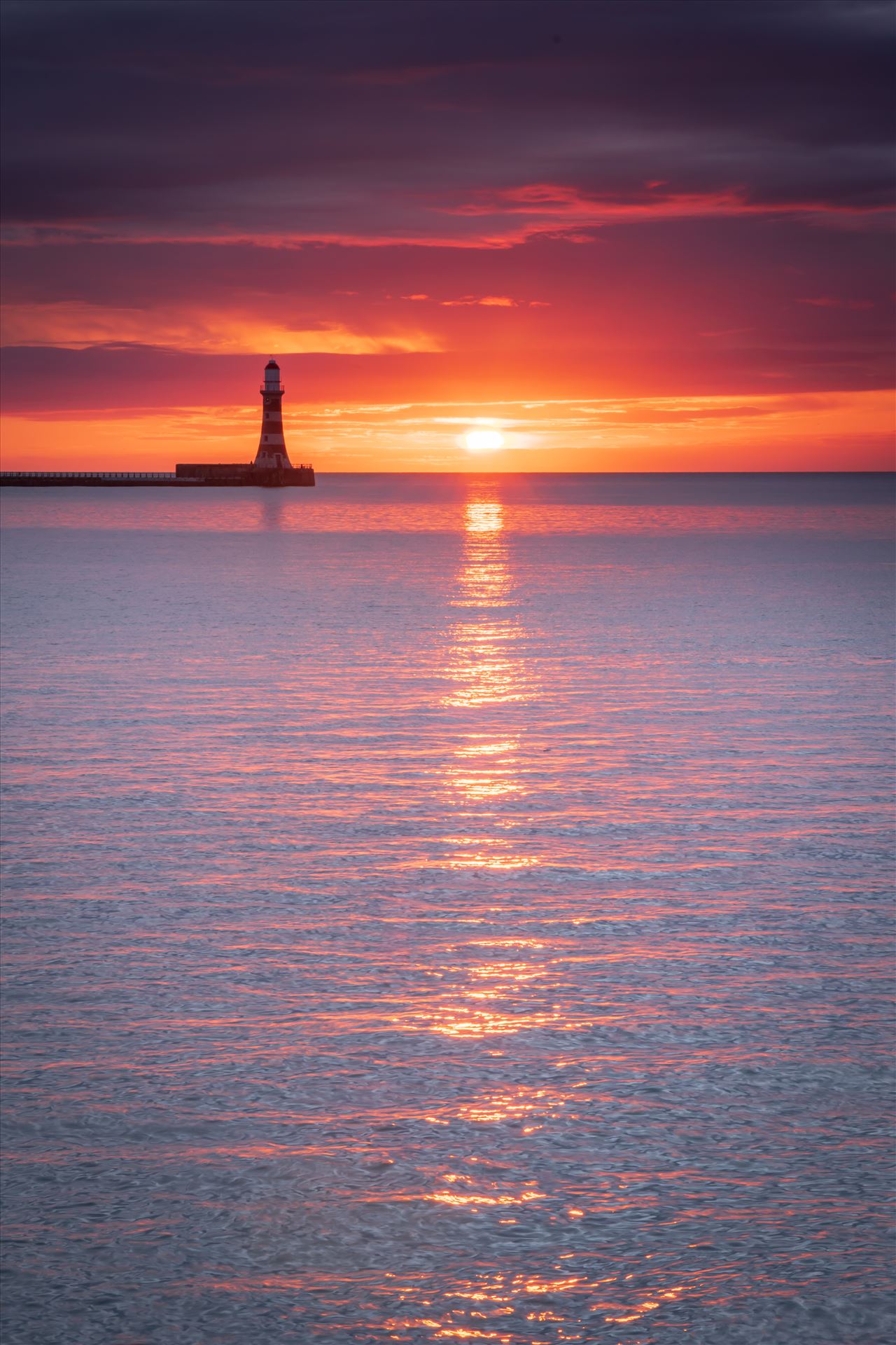 Sunrise at Roker Pier -  by philreay