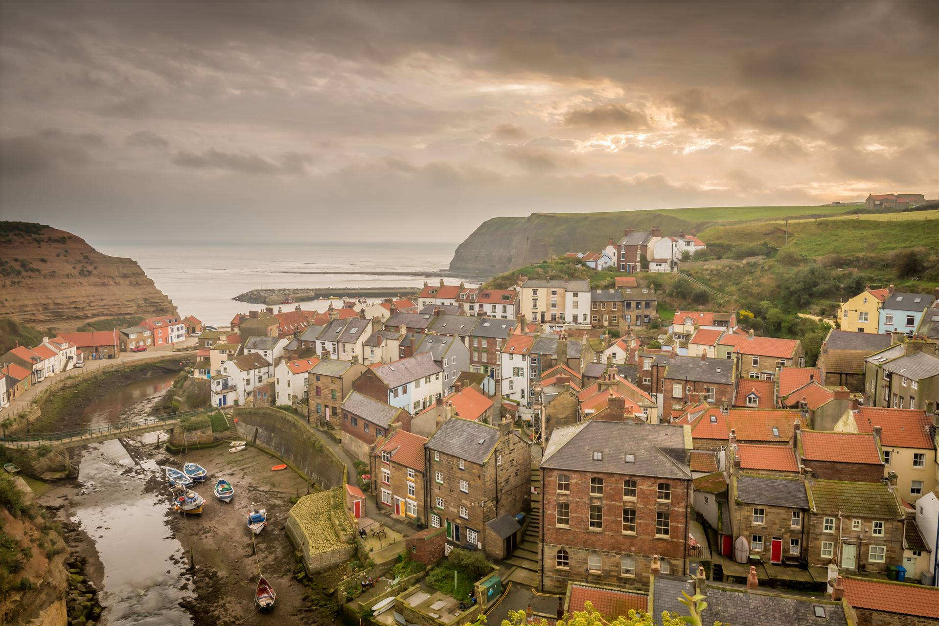 Staithes - With its higgledy-piggledy cottages and winding streets, Staithes has the air of a place lost in time & was once one of the largest fishing ports on the North East coast. by philreay