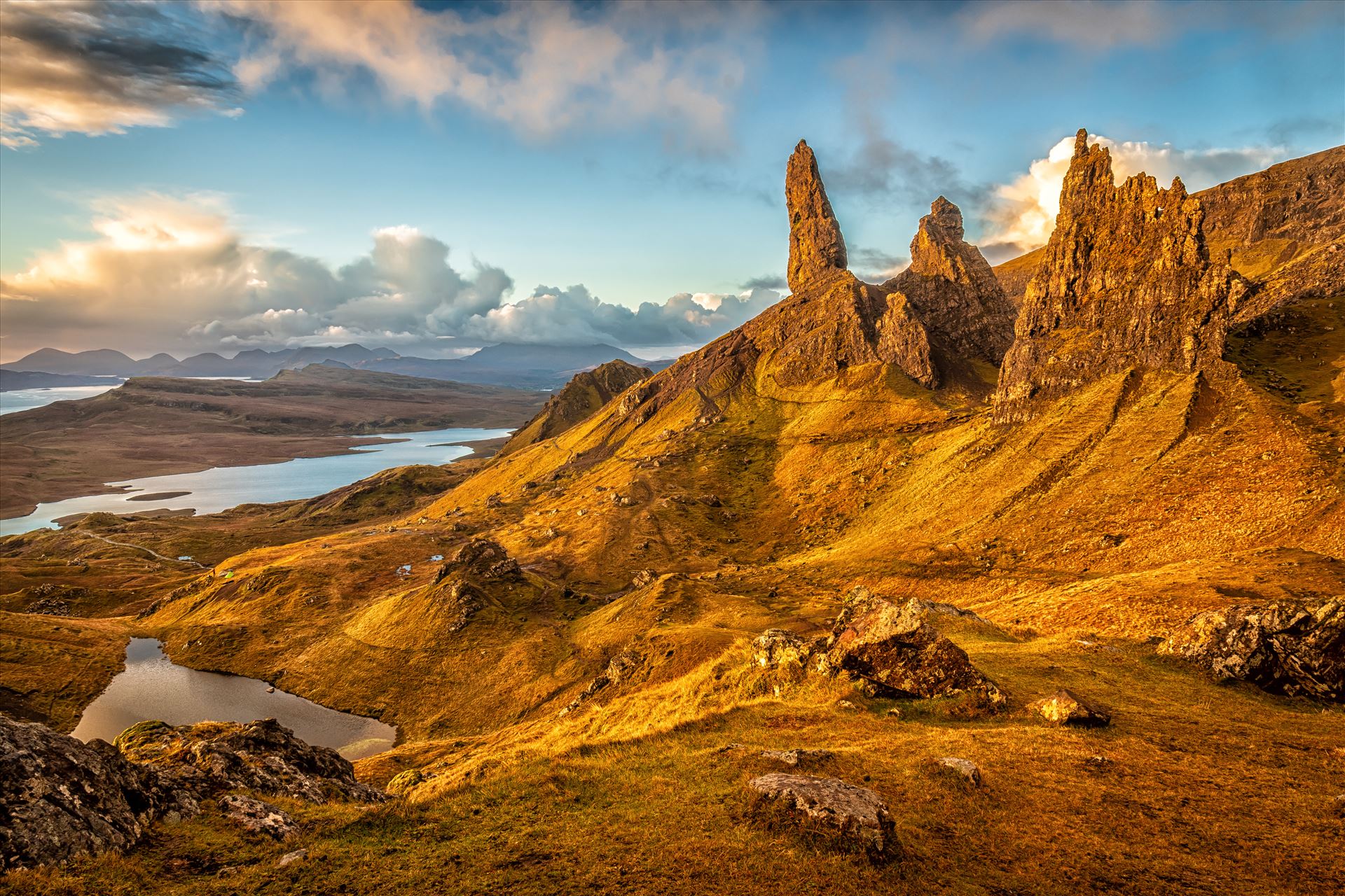 The Old Man of Storr - The Storr is a rocky hill on the Trotternish peninsula of the Isle of Skye in Scotland. The hill presents a steep rocky eastern face overlooking the Sound of Raasay, contrasting with gentler grassy slopes to the west. by philreay
