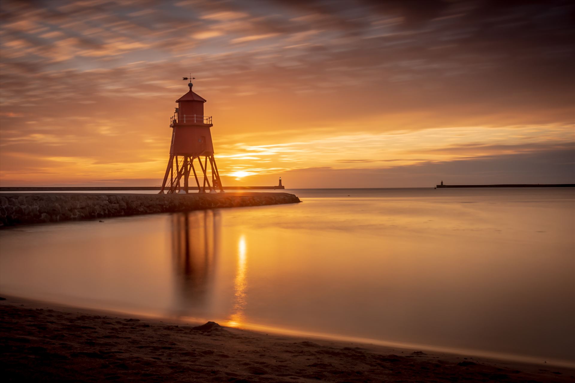 Herd Groyne lighthouse, South Shields at sunrise-long exposure -  by philreay