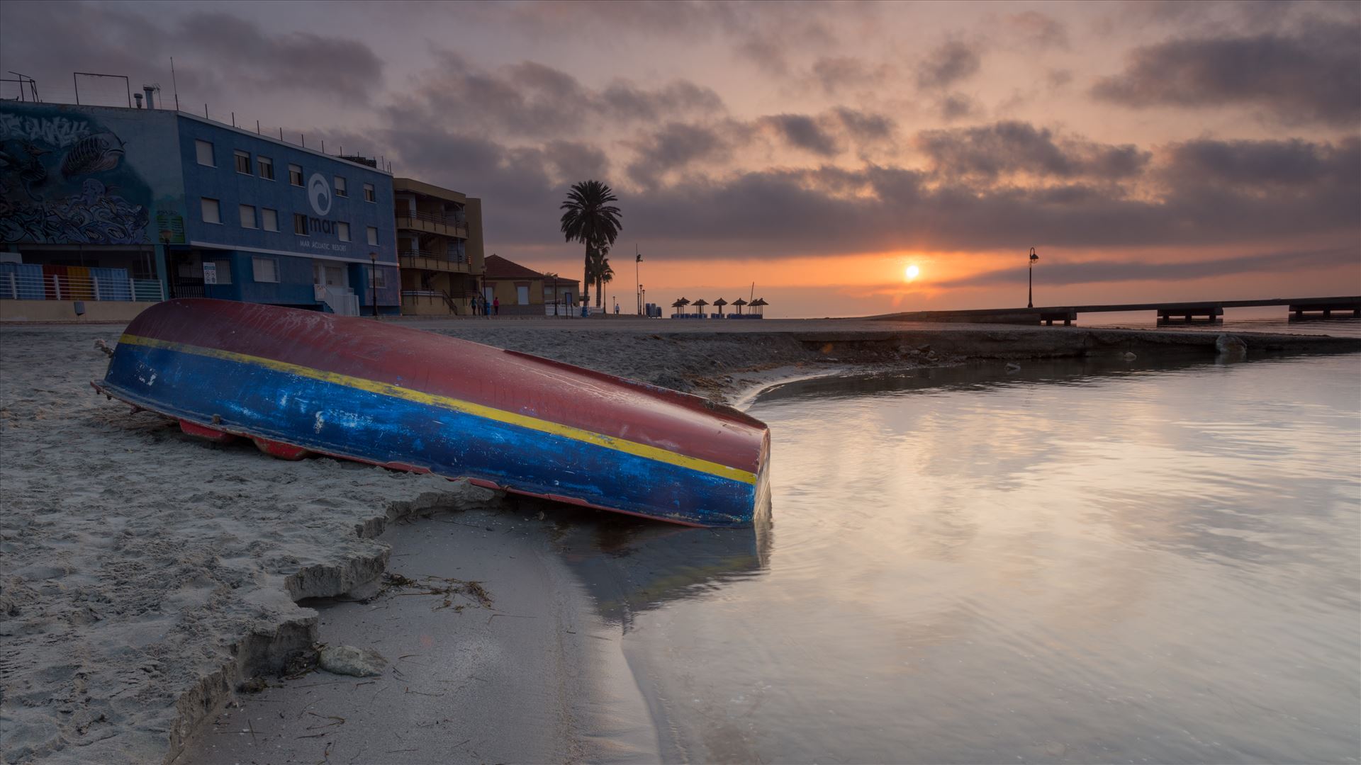 Sunrise over the Mar Menor - The Mar Menor (meaning Minor sea or Smaller Sea in Spanish)  is a coastal salty lagoon in the Iberian Peninsula of Spain with a surface area of nearly 170 km². With warm and clear water no more than 7 metres in depth, it is the largest lagoon in Spain. by philreay