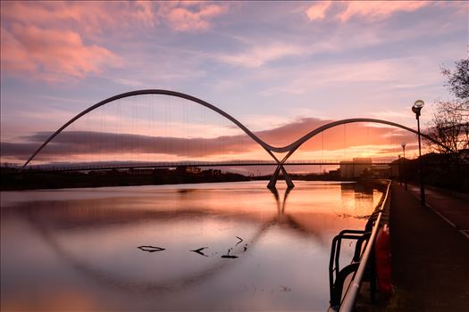 The Infinity Bridge is a public pedestrian and cycle footbridge across the River Tees that was officially opened on 14 May 2009 at a cost of £15 million.