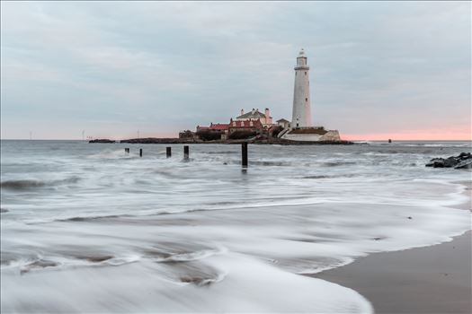 St Mary`s lighthouse, Whitley Bay - St Mary`s lighthouse stands on a small rocky tidal island is linked to the mainland by a short concrete causeway which is submerged at high tide. The lighthouse was built in 1898 & was decommissioned in 1984, 2 years after becoming automatic.