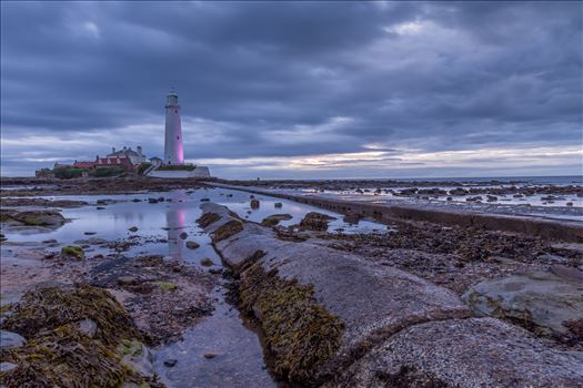 St Mary`s lighthouse, Whitley Bay - St Mary`s lighthouse stands on a small rocky tidal island is linked to the mainland by a short concrete causeway which is submerged at high tide. The lighthouse was built in 1898 & was decommissioned in 1984, 2 years after becoming automatic.