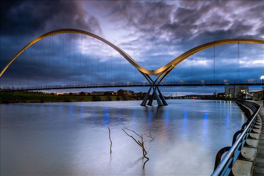 The Infinity Bridge is a public pedestrian and cycle footbridge across the River Tees that was officially opened on 14 May 2009 at a cost of £15 million.