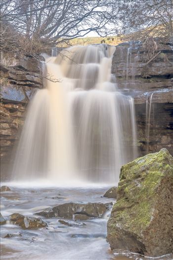 Summerhill Force is a picturesque waterfall in a wooded glade near Bowlees in Upper Teesdale.