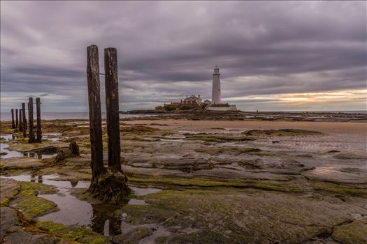 St Mary`s lighthouse, Whitley Bay - St Mary`s lighthouse stands on a small rocky tidal island is linked to the mainland by a short concrete causeway which is submerged at high tide. The lighthouse was built in 1898 & was decommissioned in 1984, 2 years after becoming automatic.
