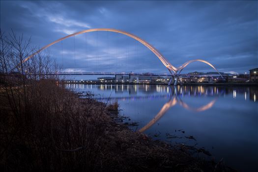 The Infinity Bridge is a public pedestrian and cycle footbridge across the River Tees that was officially opened on 14 May 2009 at a cost of £15 million.
