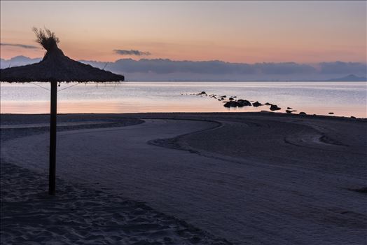 Sunrise over the Mar Menor - The Mar Menor (meaning Minor sea or Smaller Sea in Spanish)  is a coastal salty lagoon in the Iberian Peninsula of Spain with a surface area of nearly 170 km². With warm and clear water no more than 7 metres in depth, it is the largest lagoon in Spain.