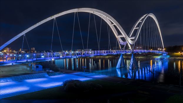 The Infinity Bridge, Stockton on Tees - The Infinity Bridge is a public pedestrian and cycle footbridge across the River Tees in the borough of Stockton-on-Tees in the north-east of England. The name derives from the infinity symbol formed by the bridge and its reflection.