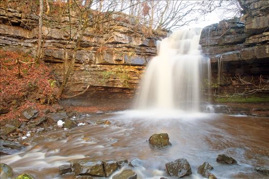 Summerhill Force is a picturesque waterfall in a wooded glade near Bowlees in Upper Teesdale.